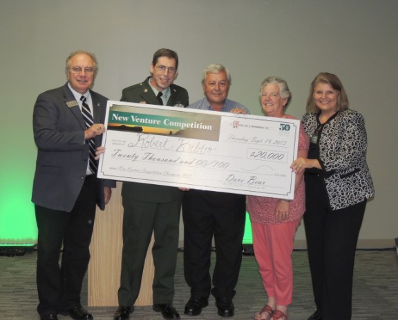 From left: James Tolbert, Business Administration assistant professor; 2013 New Venture champion Robert Bibbo; Dave Bear, president of JB Tool, Die & Engineering, Inc., and New Venture sponsor; Mary Bear, Dave Bear’s wife; and Jerrilee Mosier, Ivy Tech Northeast chancellor