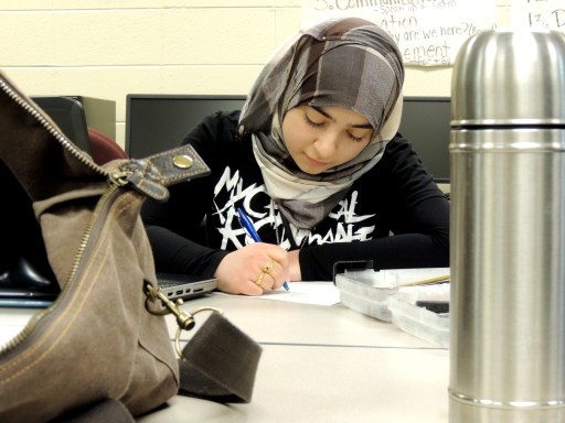  Ivy Tech Northeast ASAP student Fatima Al Timeemy writes a pen pal letter to third graders at West Noble Elementary in Ligonier.