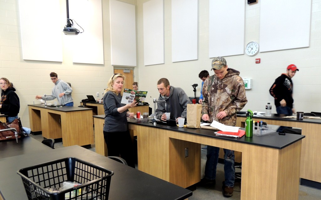 Introduction to Agriculture students work in the Farm Credit Mid-America Laboratory at Ivy Tech Northeast. The classroom is attached to the College’s greenhouse and is used by Agriculture students and for landscaping classes.