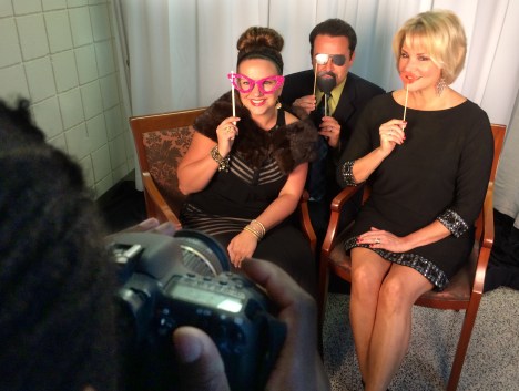  From left: Heather Schoegler, Tommy Schoegler, and Melissa Long have their photos snapped at the photo booth for guests. Tommy Schoegler and Long, media personalities with 21Alive, served as emcees for A Reason to Taste: City of Lights.