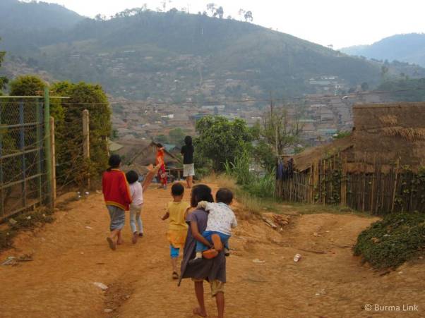Children playing in Umpiem Mai, where Shwe and his family moved after their first camp, Hwake Ka Loke, was burned down in 1999. Photo courtesy  Ariana Zarleen (Burma Link)