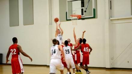 The Ivy Tech Titans (white) face off against the Grace College All-Stars in the Student Life Center Gymnasium on Feb. 17. Ivy Tech Northeast began sanctioning club sports in 2015, beginning with basketball, as another means to increase student persistence and graduation rates.
