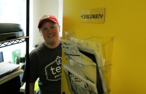 Hinton's office used to belong to a children's minister. She opted to keep the sign. The back of the door is a purple-y magenta.