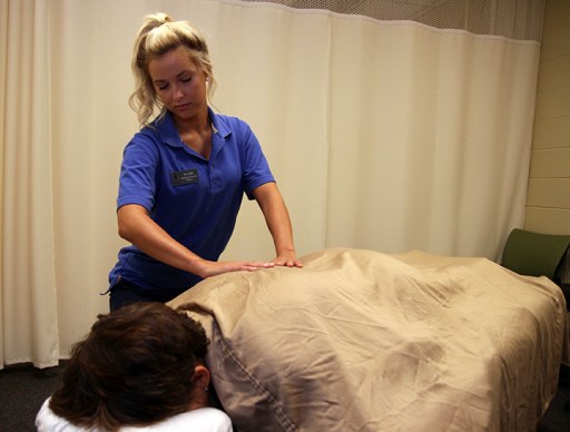 Allie Bowman works on a client in fall 2015 at Healthy Essence, the Ivy Tech Northeast massage clinic run by therapeutic massage students.