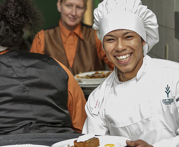 A hospitality student at the Chancellor's Scholarship Dinner