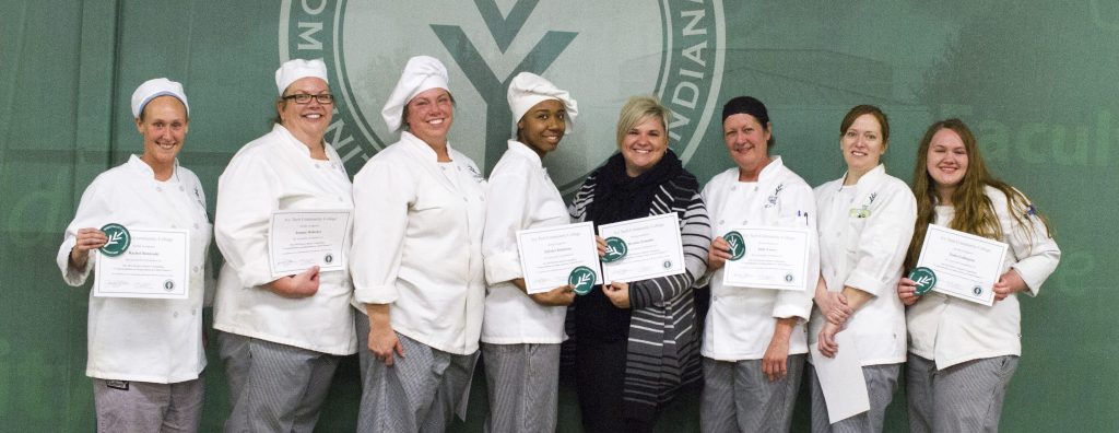 The eight winning students, who will travel to France in May, are (from left): Rachel Bonkoski, of Auburn; Joanne Holscher, of Fort Wayne; Teresa Thurston, of Fort Wayne; DeEdra Robinson, of Fort Wayne; Brenda Zemaitis, of Fort Wayne; Julie Lowry, of Fort Wayne; Jeanette Win, of New Haven; and Tasha Fullington, of Angola