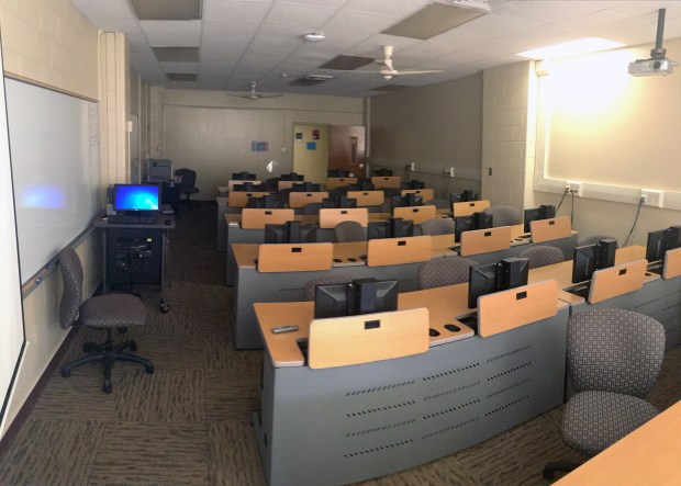 See that aisle up the lefthand side of the pic? That's where the instructor got to pace. See which way the chairs face? Not at the instructor.