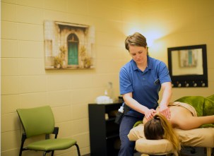 Healthy Essence has four private rooms. They are sectioned off with curtains, and therapeutic massage students can work with clients to address their massage needs.