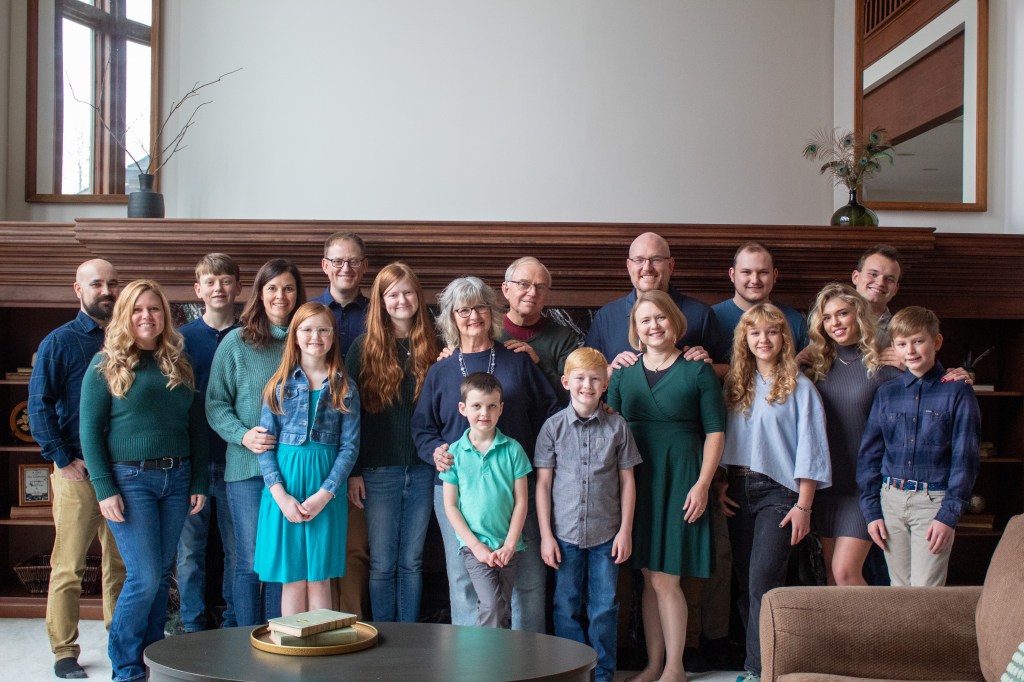 Anastasiia poses with her in-laws; photo provided by Anastasiia